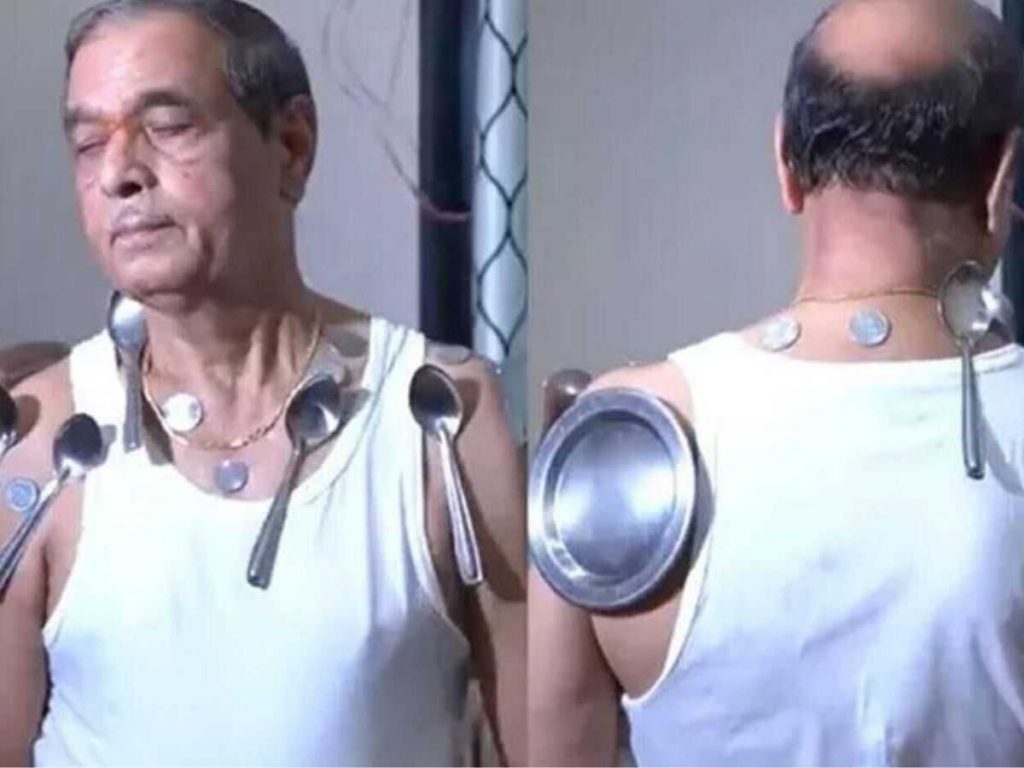 Maharashtra Nasik Man shows magnetic power after corona second dose 